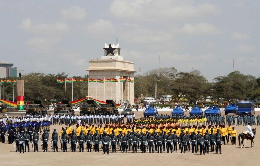 Wide view of Ghana’s Independence Day parade at Black Star Square in Accra with military formations and national flags.